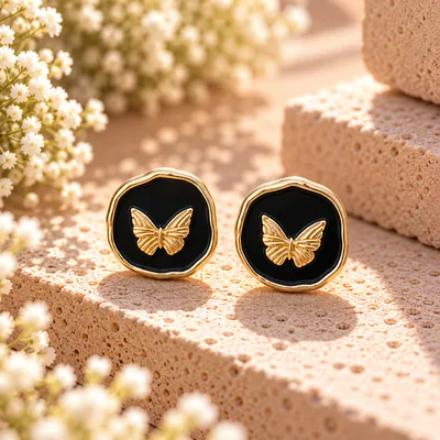 CIRCULOS NEGROS MARIPOSAS DORADAS